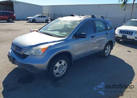 2009 Honda Cr-V Lx z USA, uszkodzony, nr VIN JHLRE38399C013207